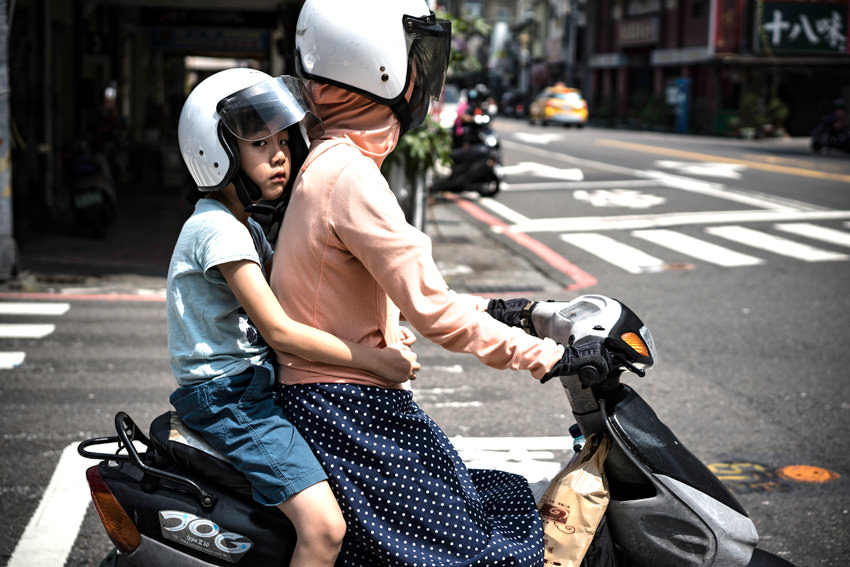 Parent and child on same motorbike