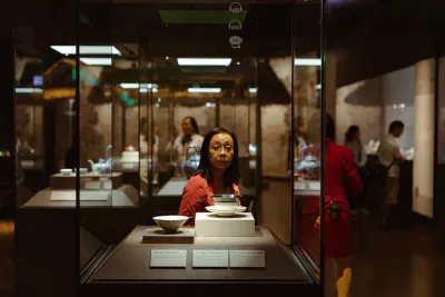 Woman standing in front of display