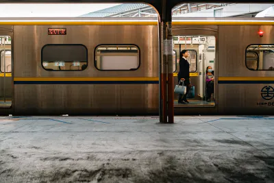 Woman in train car