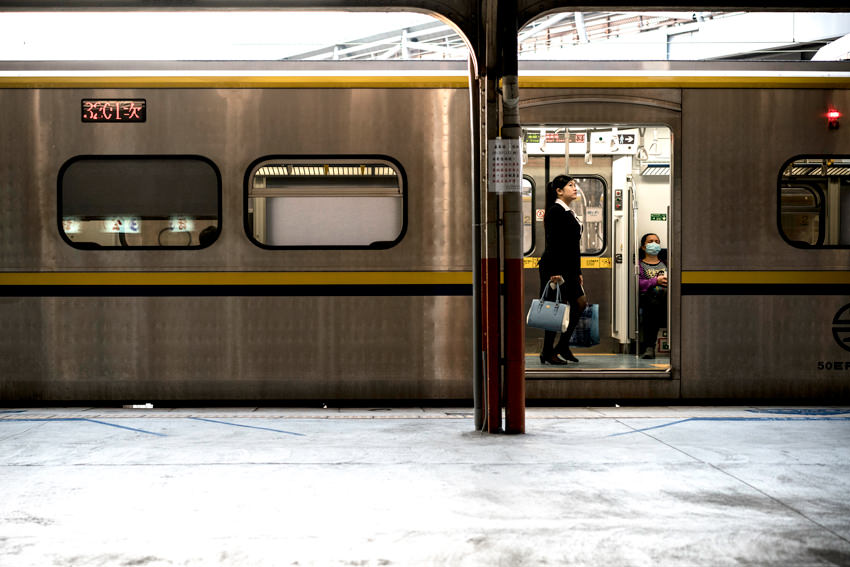Woman in train car
