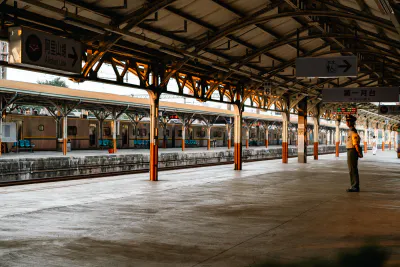 Station staff standing on platform