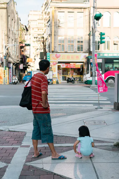 Father and daughter waiting at stoplights