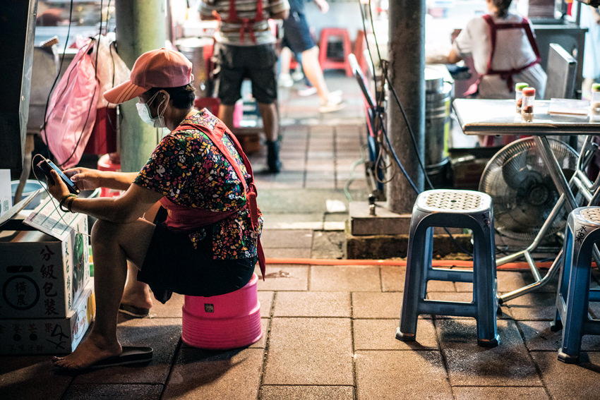 woman watching smartphone