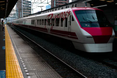 Express train passing Higashi Mukoujima station