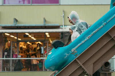 Father and kid on roller coaster