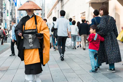 Buddhist monk in crowd