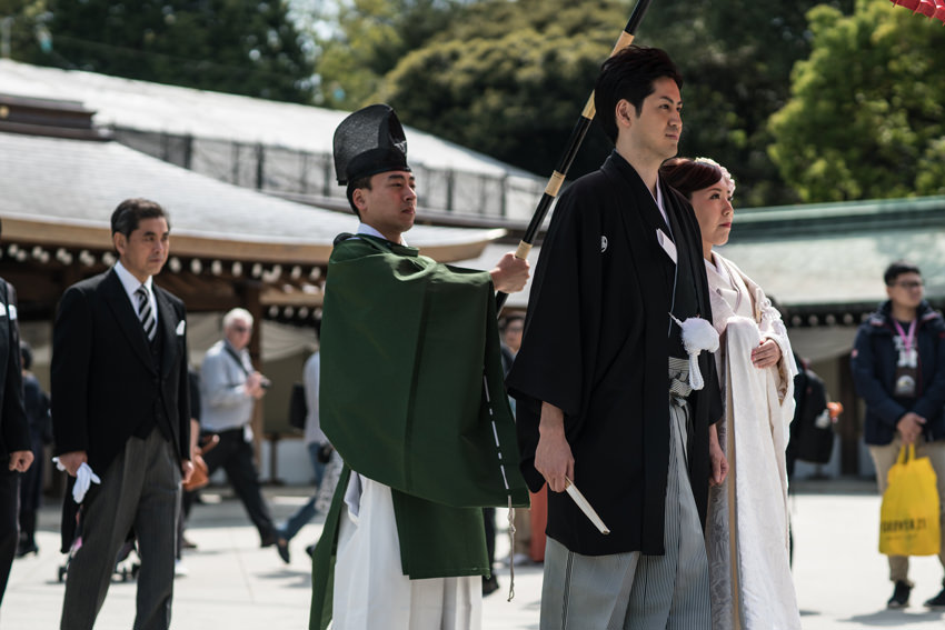 bridal couple and Shinto priest