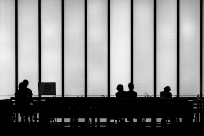 Silhouettes in cafe