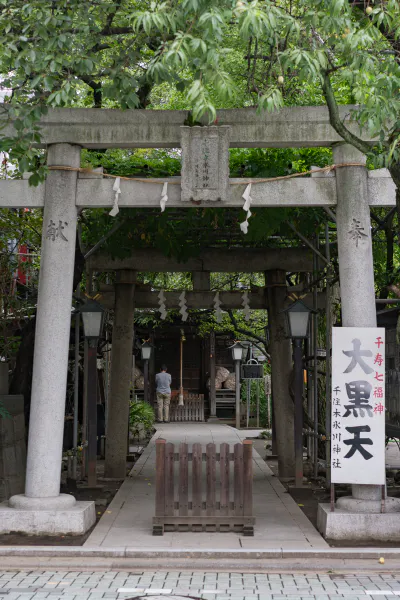 Worshiper praying in front of hall