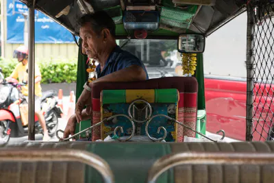 Tuk-tuk driver with rough look
