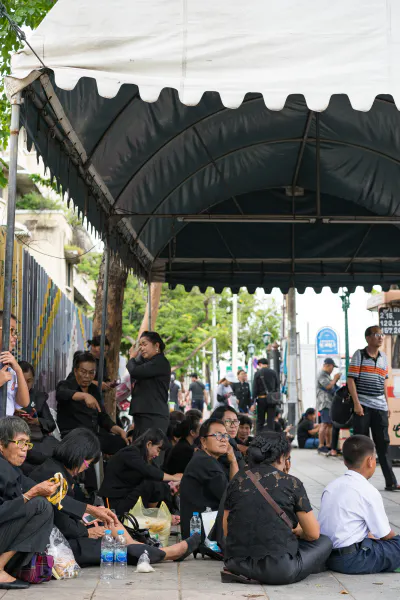 People wearing mourning clothes