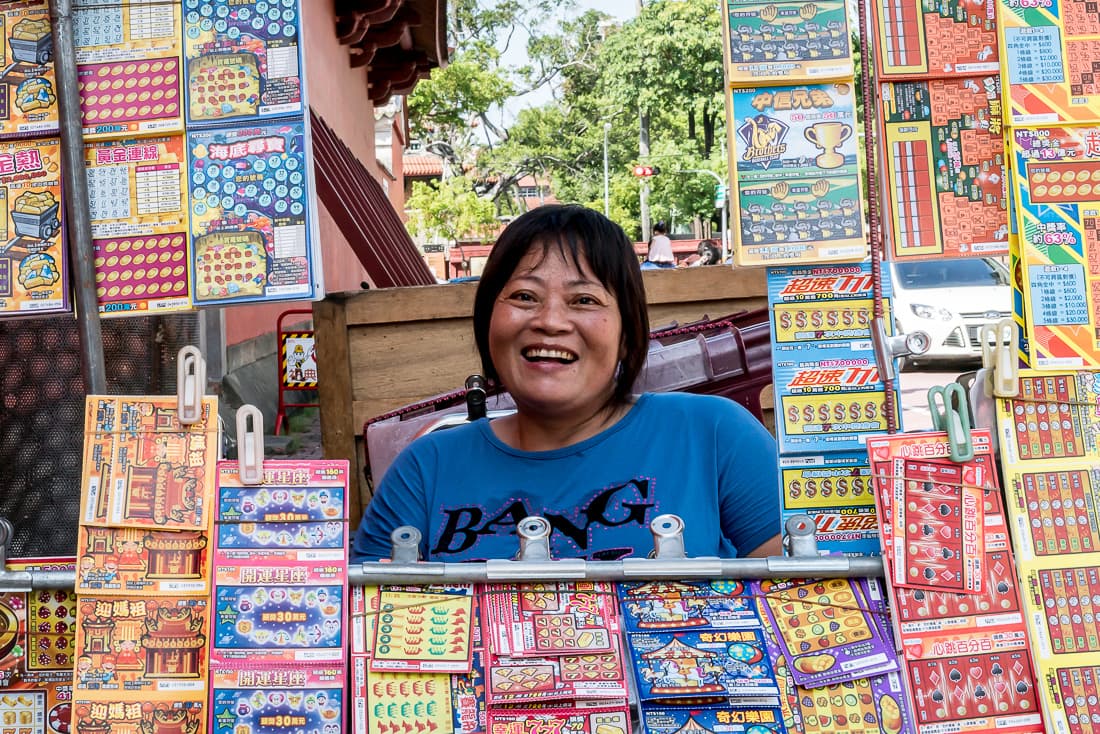 woman selling lottery