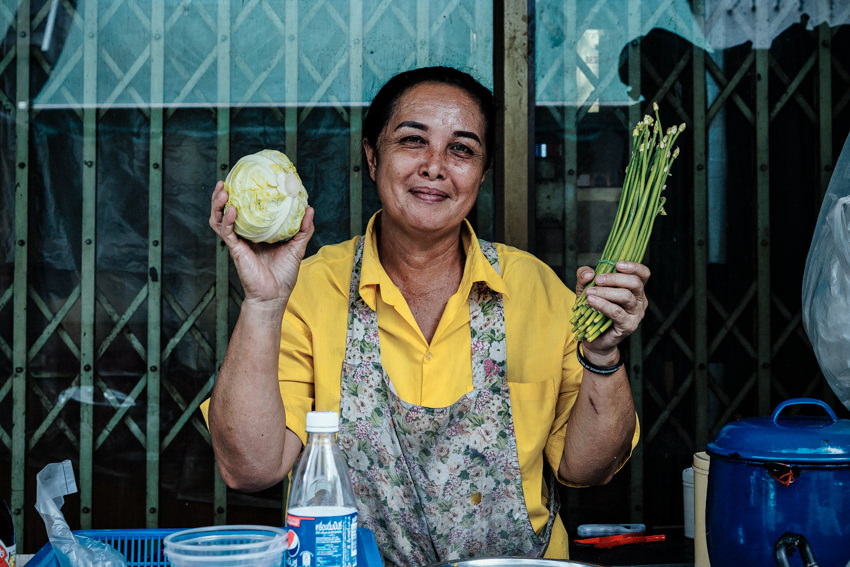 Woman having cabbage and chive