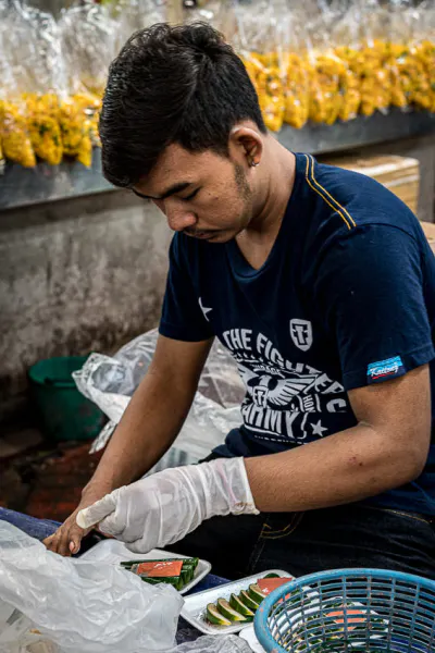Man packing in plastic containers