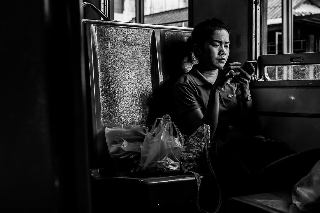 Young woman waiting for departure in car