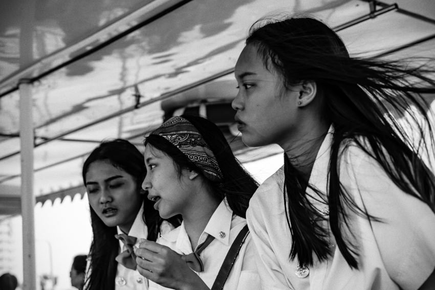 Three schoolgirls on passenger ferry