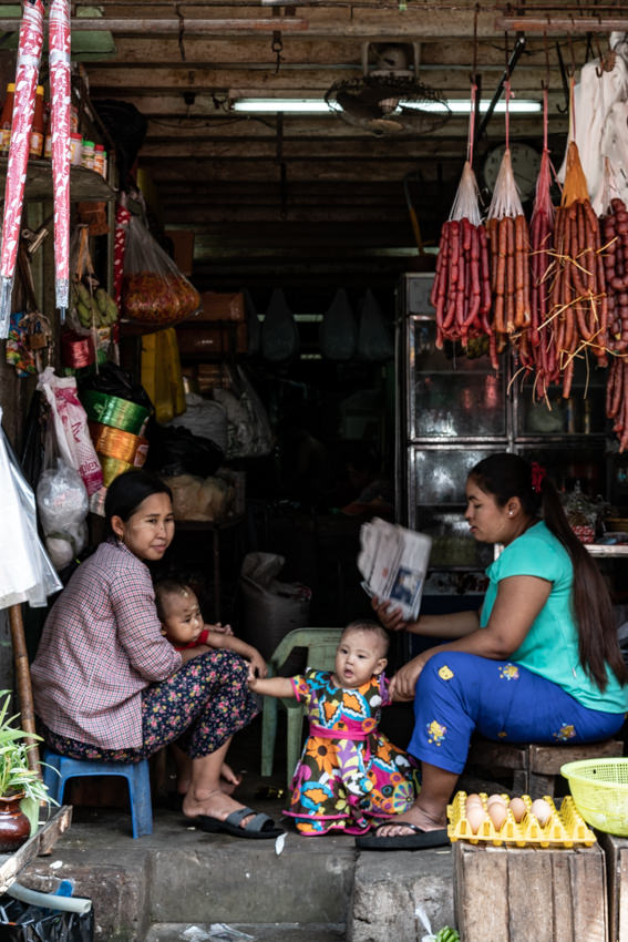 Family in storefront