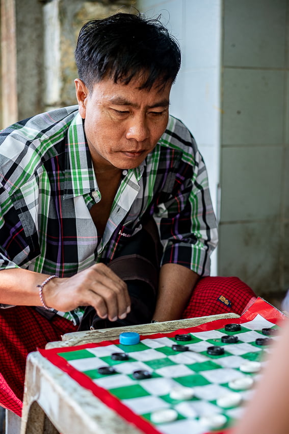 Man playing checkers