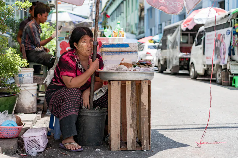 Woman hanging on pole