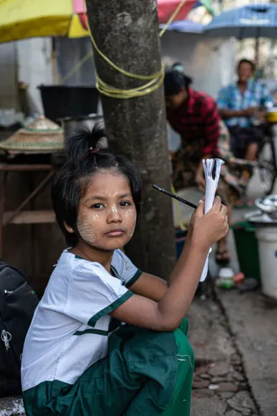 Girl taking a note by wayside