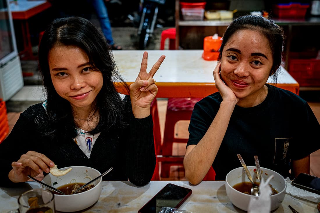 Two girls in a noodle shop