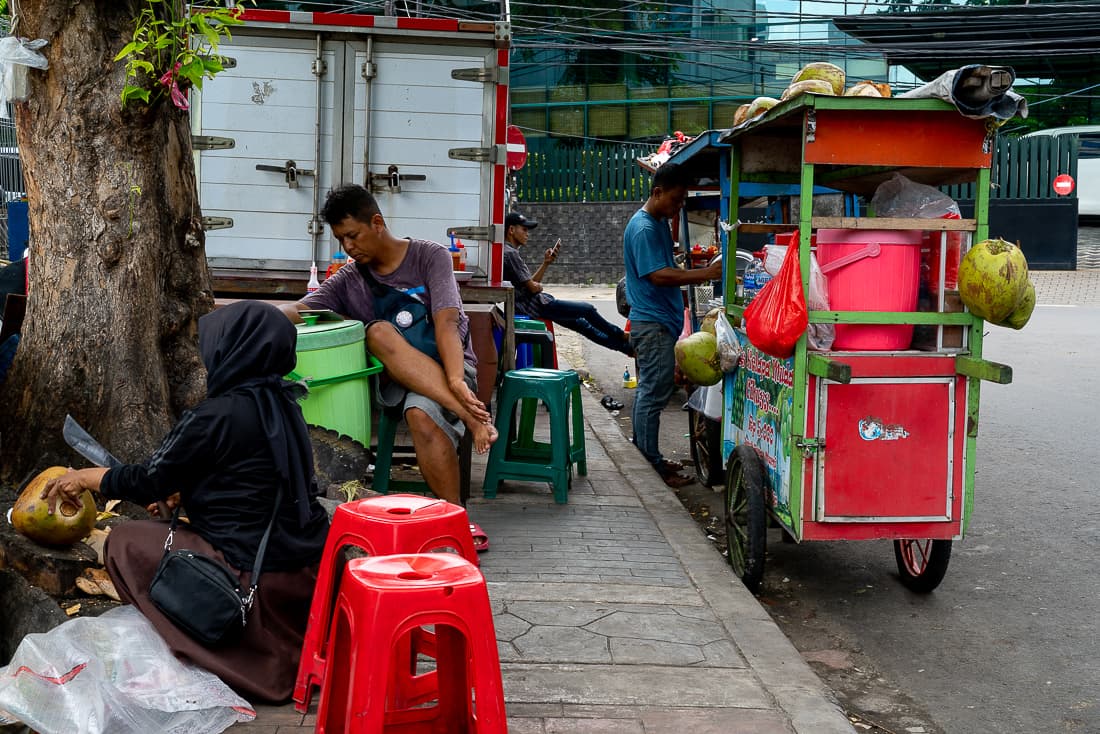 People preparing to open a food stall in Jakarta