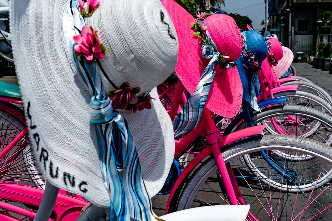 Rental bikes and colorful hats