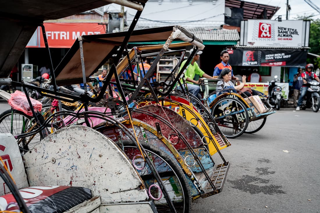 Becak parked in front of Cirebon station