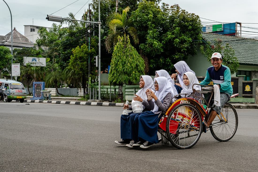 Becak with five schoolgirls