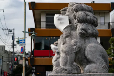Masked guardian dogs standing on Wakamiya-Oji Street