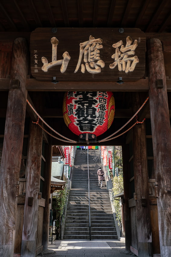 The gate, the plaque and the lantern of Gumyo-ji Temple