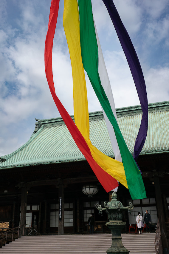 Buddhist flag fluttering at Gokoku-ji Temple