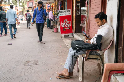 Man staring at his phone