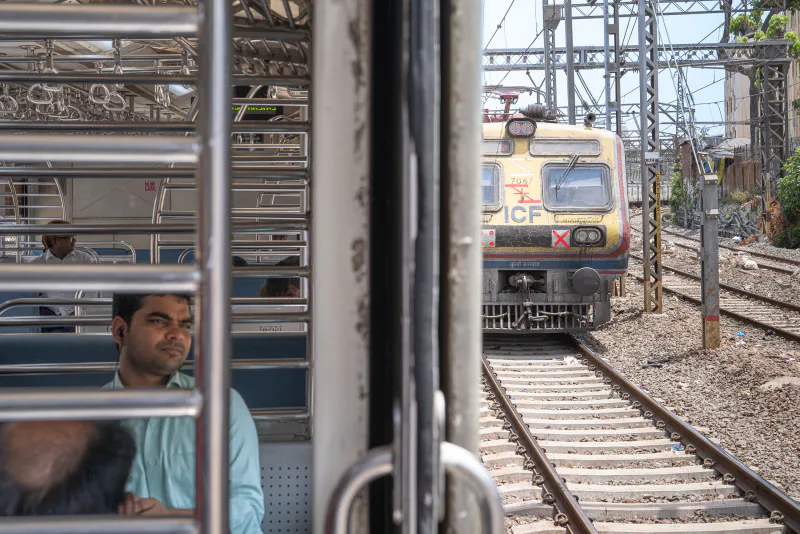 Inside the car and the train going in the opposite direction