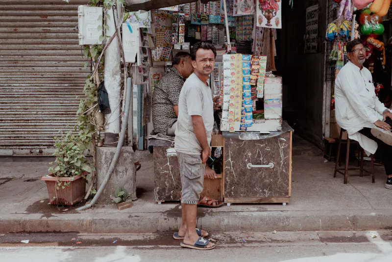 Man wearing sandals with Louis Vuitton logo