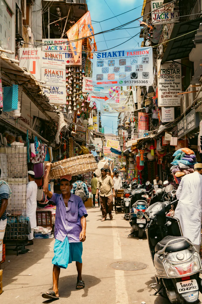 Carriers with baskets on their heads