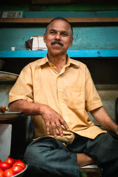 Man selling tomatoes