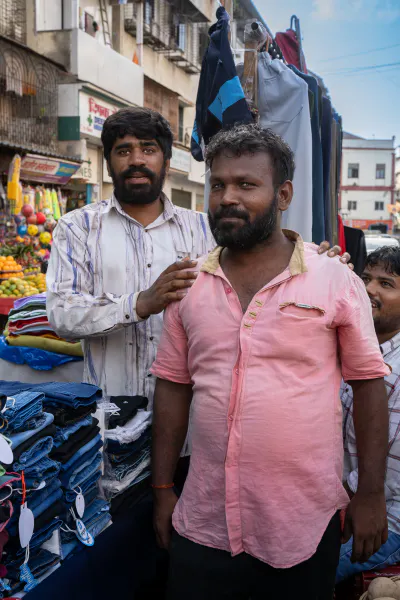 Men selling trousers