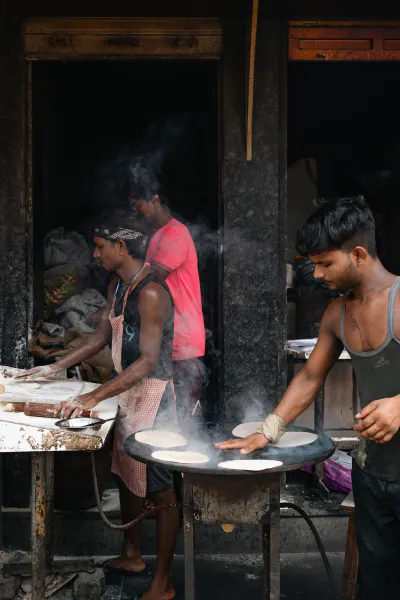 Men making rotis