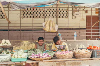 Parent and child working at a grocery store