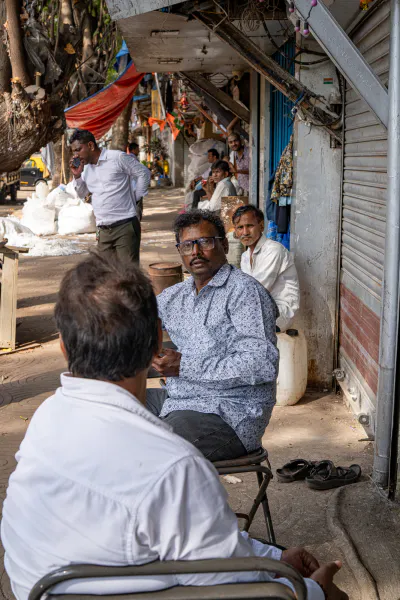 Two men on the sidewalk