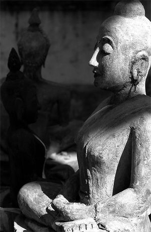 Statue slipping into meditation