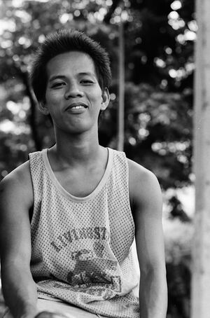 YOung man giving bitter laugh