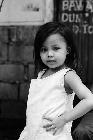 Little girl posing like a model