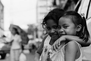 Two girls giving sideways look