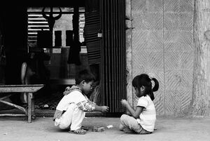Boy and girl playing together