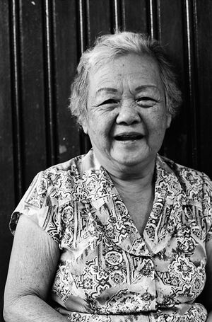 Cheerful older woman in jetty