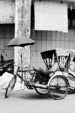 Trishaw with umbrella