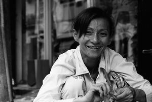 Woman working by roadside