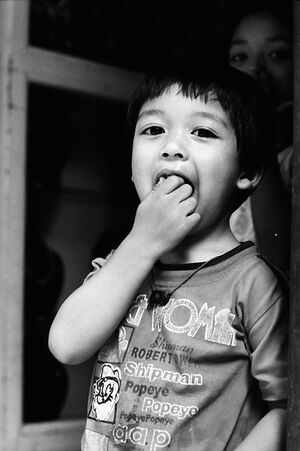 Kid filling mouth